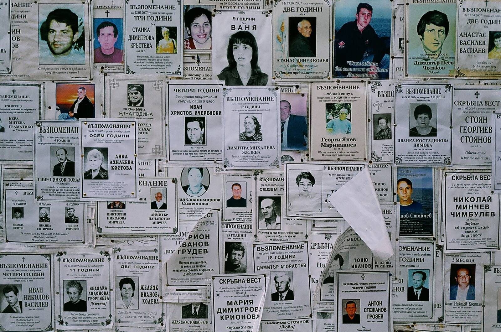 A board layered with necrolog death notices